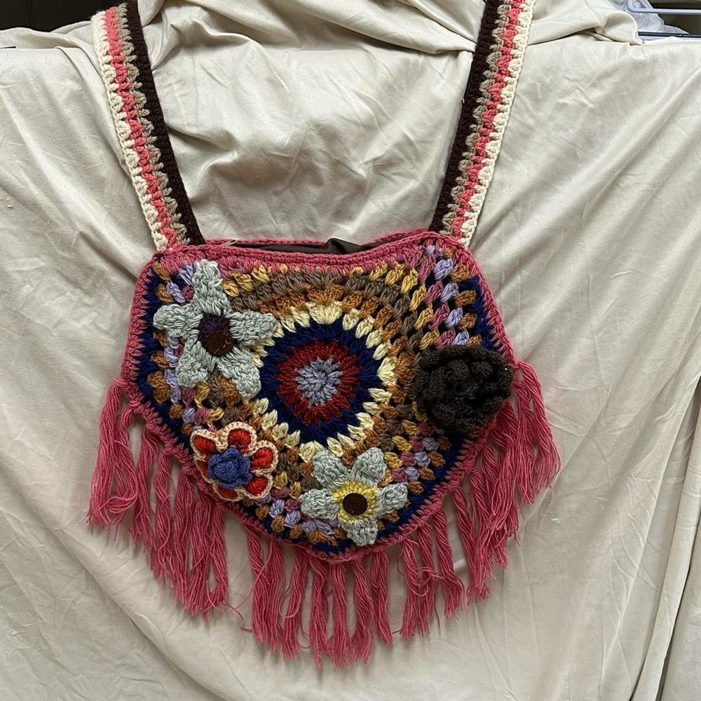Floral Boho crochet cross body bag with tassels.
